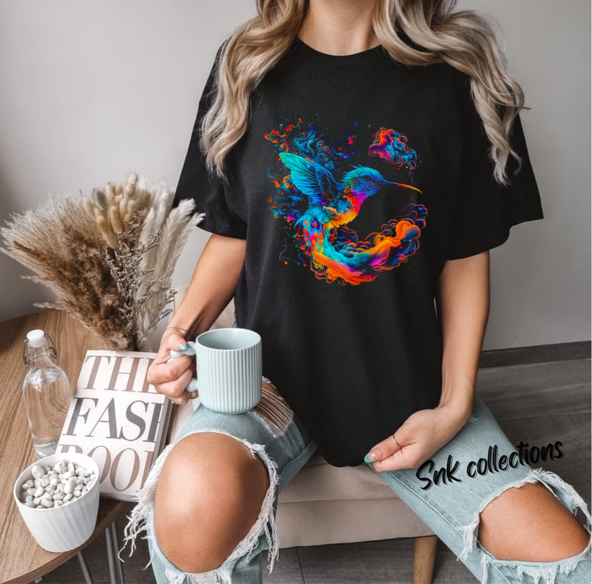 $16 Blue hummingbird on a black T-shirt